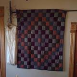 Make Your Guests Feel At Home by Decorating with Quilts