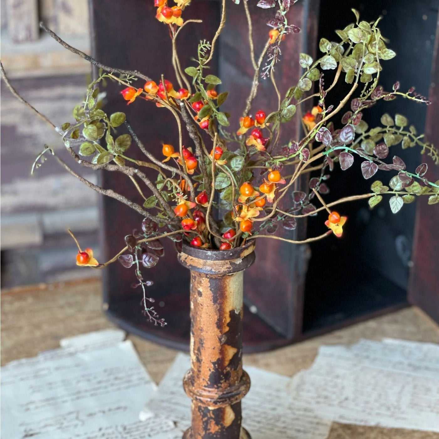 Leaf and Bittersweet greenery spray bush in vase