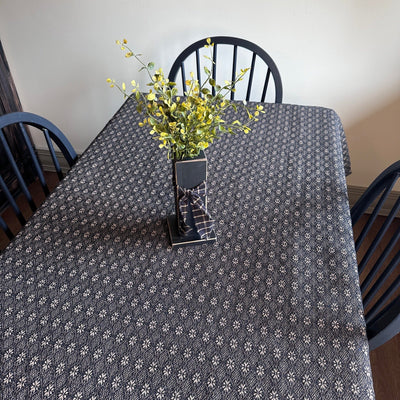 Black and tan 54 inch table cloth in the Packsville Rose Pattern - Primitive Star Quilt Shop